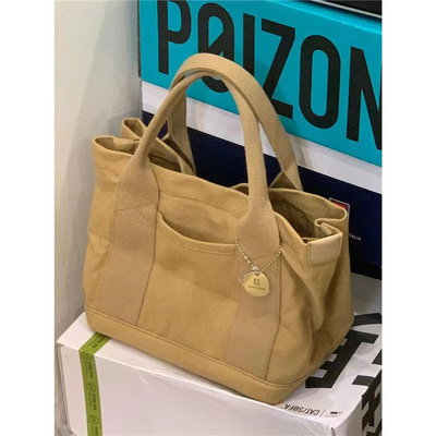 2024 NEW HIGH-END SENSE OF NICHE DESIGN CANVAS TOTE BAG BAG nữ thời trang tất cả các vintage tay đơn tay qua tay