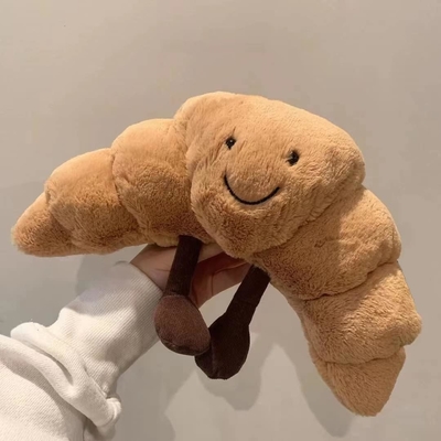 Đánh nặng 9 inch Croissant Plush Cute Smile Croissant Bánh gối Đặt đầy động vật Đồ ăn mềm buồn cười