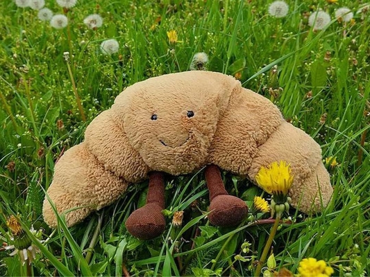 Đánh nặng 9 inch Croissant Plush Cute Smile Croissant Bánh gối Đặt đầy động vật Đồ ăn mềm buồn cười